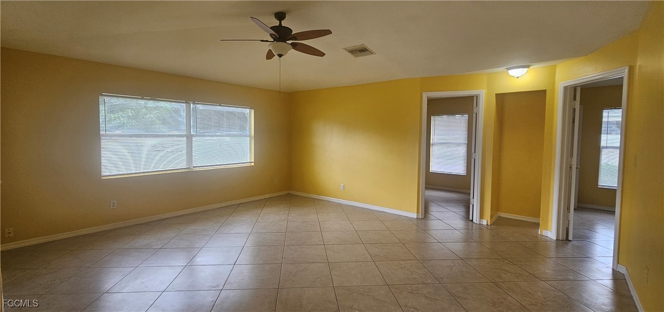 4722 30th Street Southwest Lehigh Acres, FL 33973 - Photo 4 of 12 a view of an empty room with a window