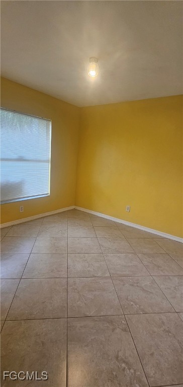 4722 30th Street Southwest Lehigh Acres, FL 33973 - Photo 7 of 12 a view of a room with an empty space