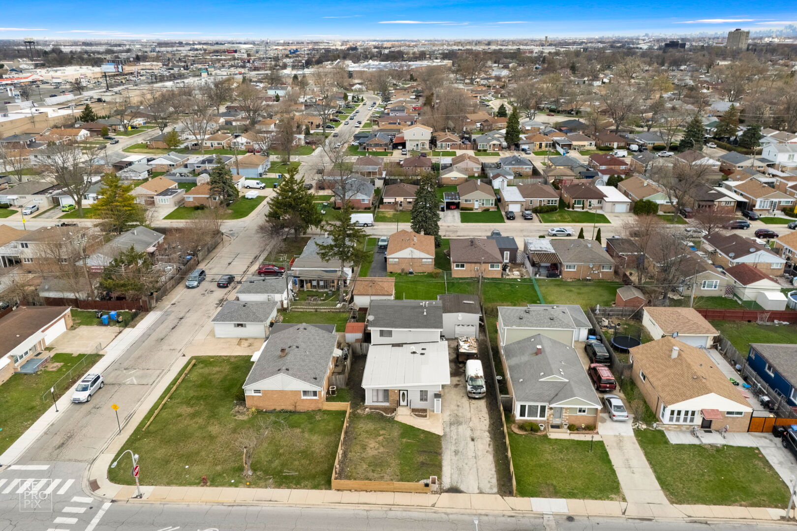 4680 West 83rd Street Chicago, IL 60652 - Photo 21 of 22 an aerial view of residential houses with city view
