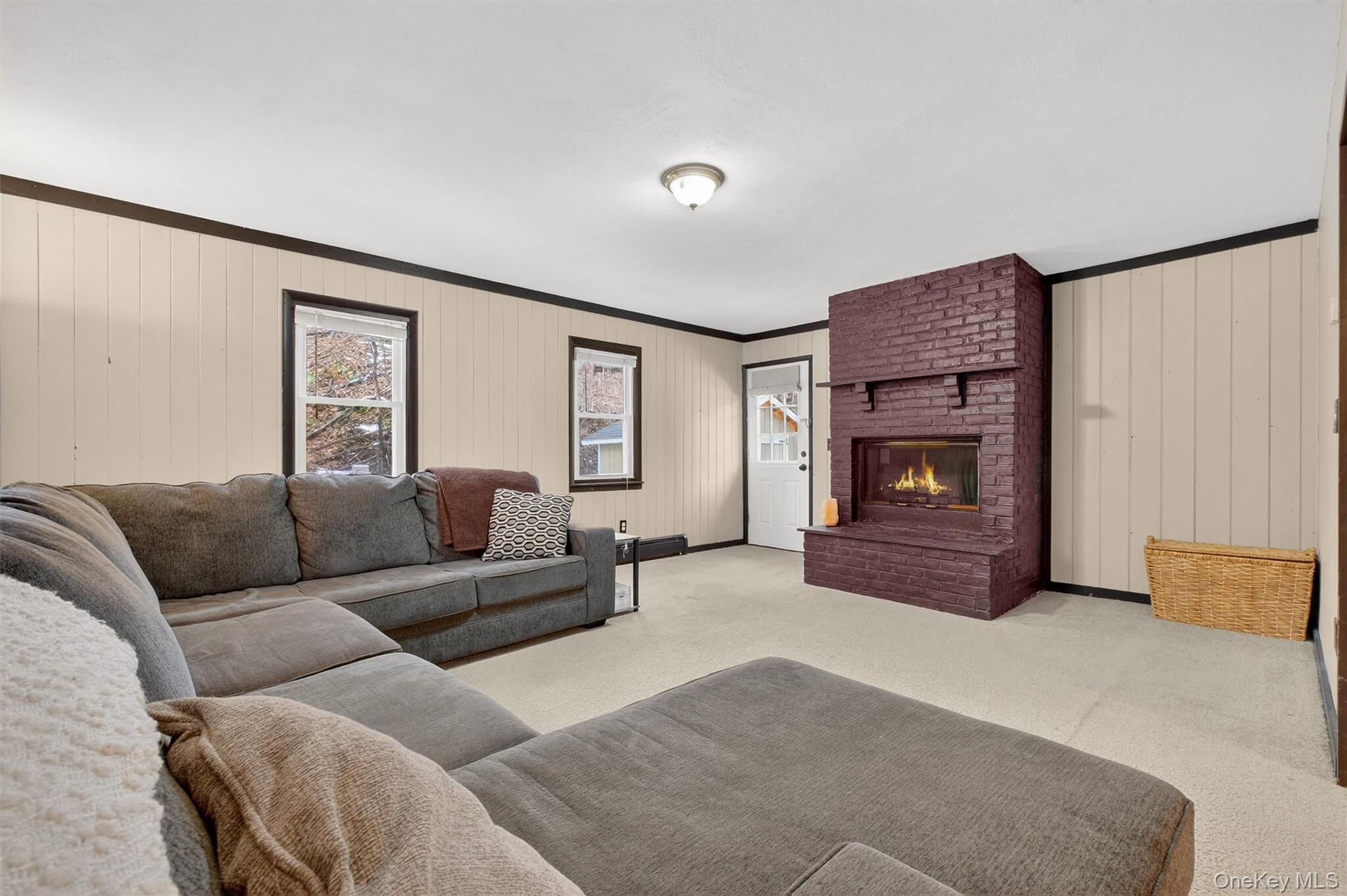 44 Legion Road Poughkeepsie, NY 12601 - Photo 16 of 28 a living room with furniture and a fireplace