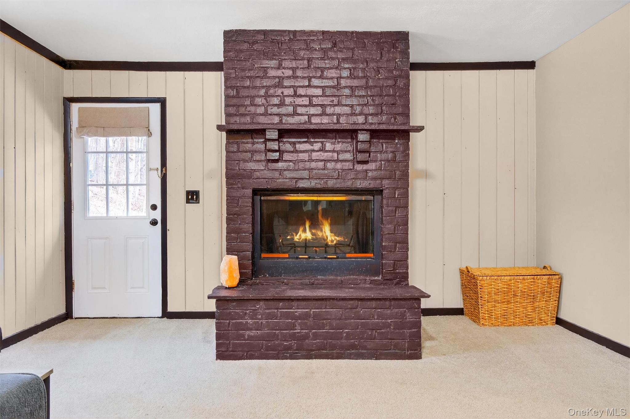 44 Legion Road Poughkeepsie, NY 12601 - Photo 18 of 28 a living room with furniture a fireplace and a window