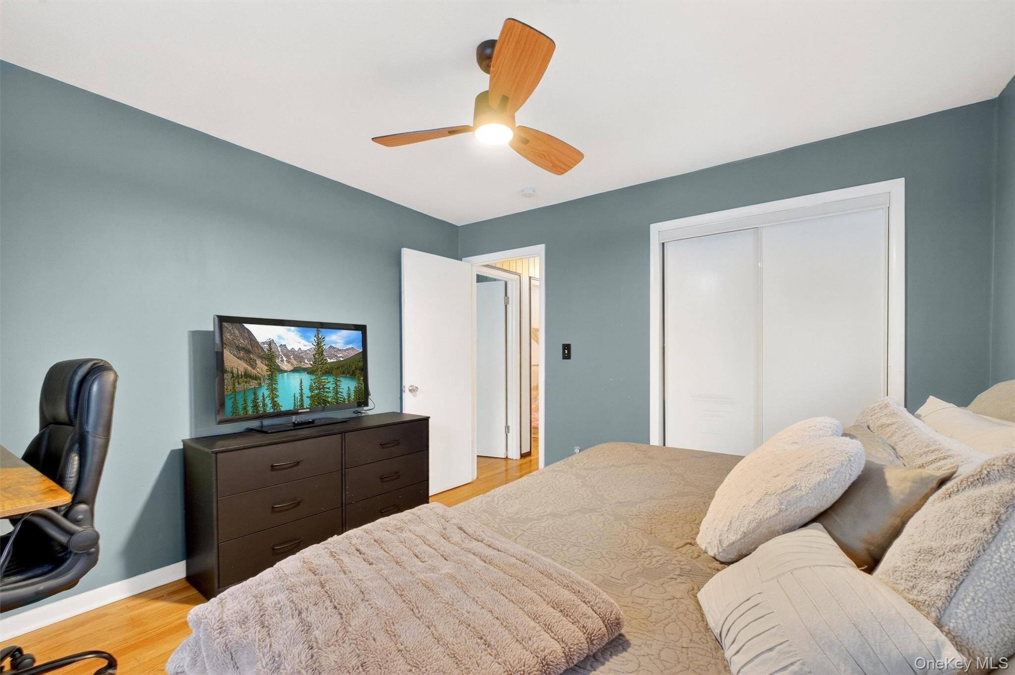 44 Legion Road Poughkeepsie, NY 12601 - Photo 20 of 28 a bedroom with a bed and a flat screen tv