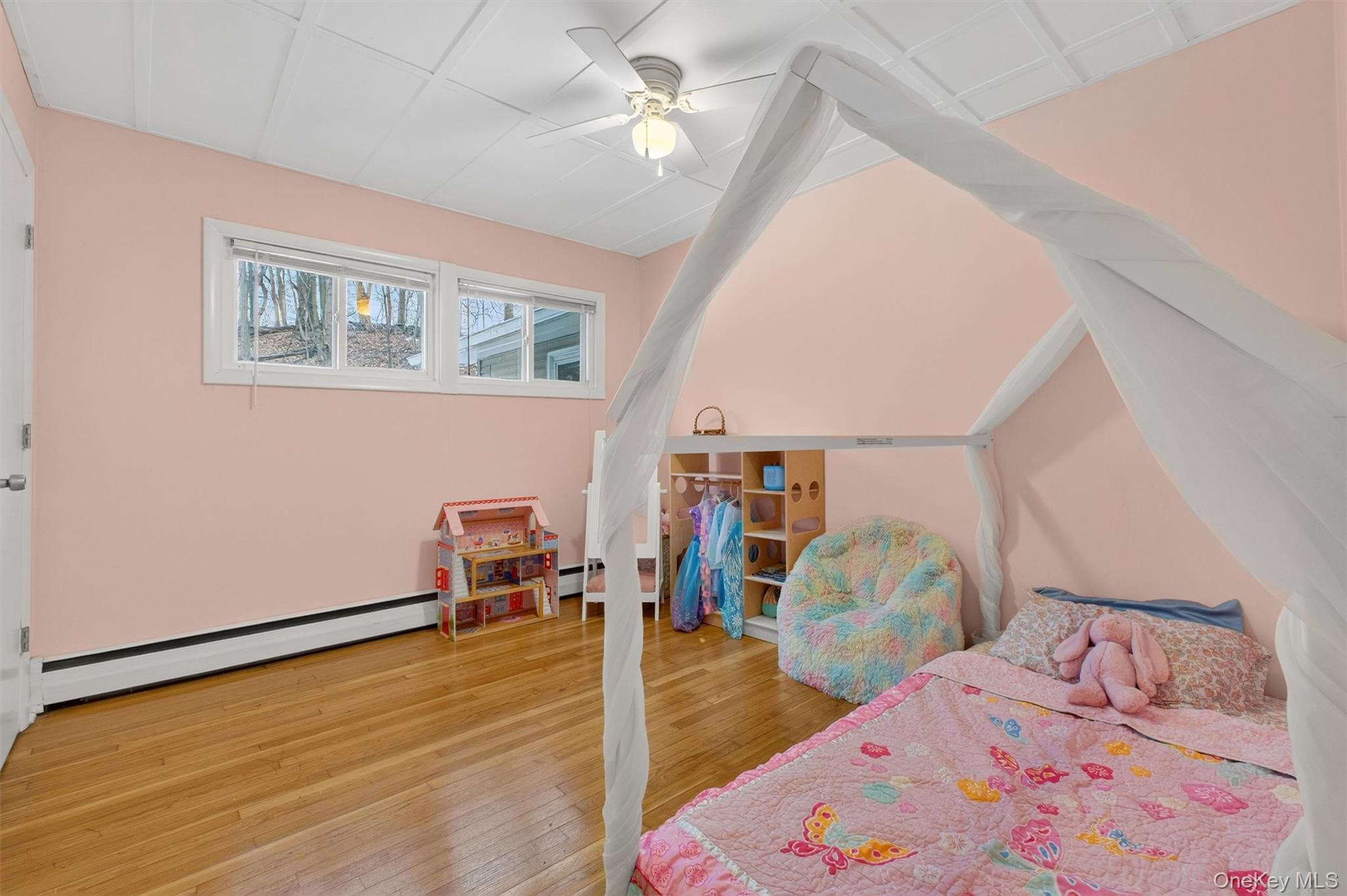 44 Legion Road Poughkeepsie, NY 12601 - Photo 24 of 28 a bedroom with furniture and a wooden floor