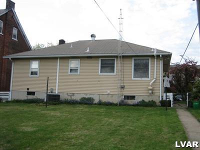813 Spring Street Bethlehem, PA 18018 - Photo 3 of 12 a brick house with a yard