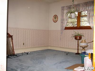 813 Spring Street Bethlehem, PA 18018 - Photo 5 of 12 an empty room with a window