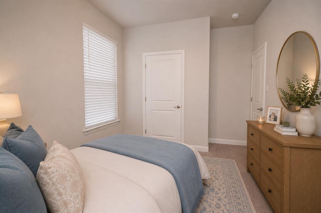 1804 Mensa Drive Haslet, TX 76052 - Photo 20 of 30 Carpeted bedroom with neutral wall tones, a window with horizontal blinds, and a paneled interior door
