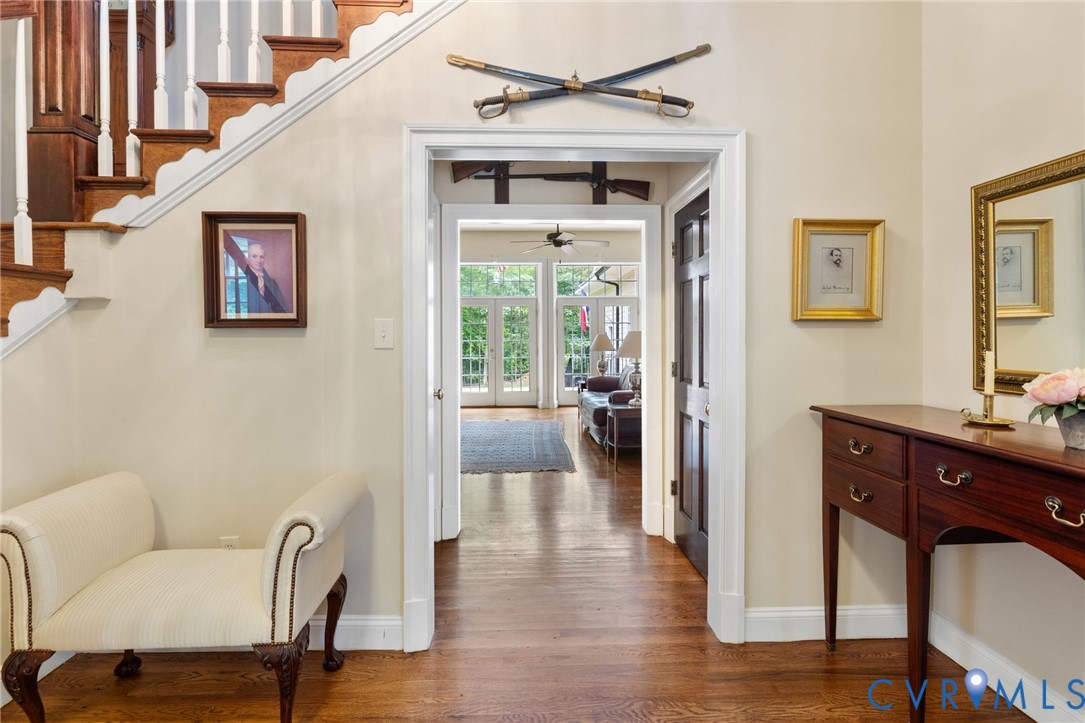 13173 Scotchtown Road Beaverdam, VA 23015 - Photo 9 of 65 a hallway with couches and wooden floor