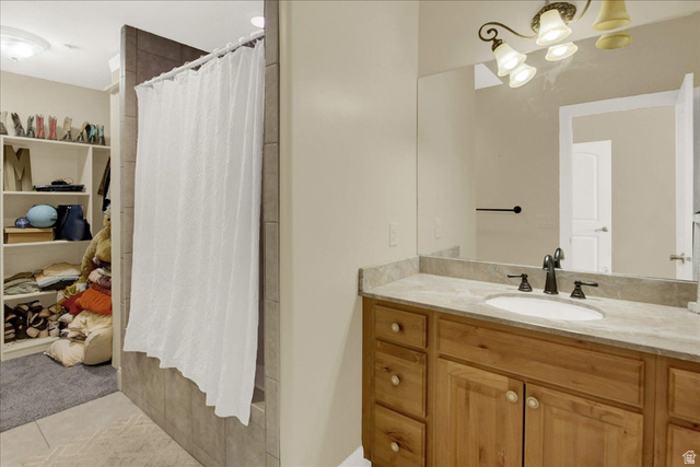 667 Hardscrabble Road Morgan, UT 84050 - Photo 29 of 51 North Upstairs Bedroom Bathroom with a shower stall, vanity, and hanging lights