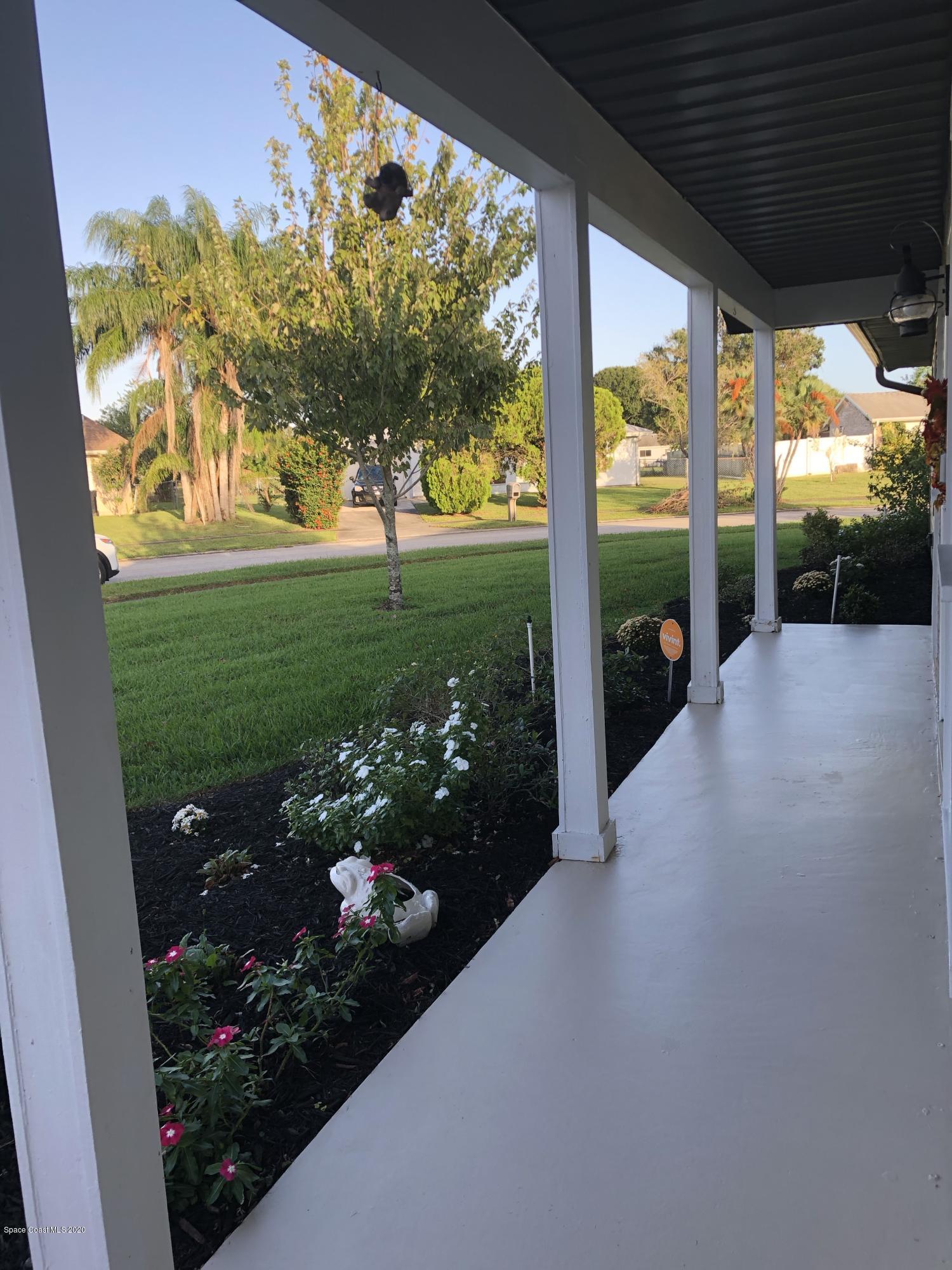 1491 Creel Road Northeast Palm Bay, FL 32905 - Photo 12 of 50 a view of a porch and garden