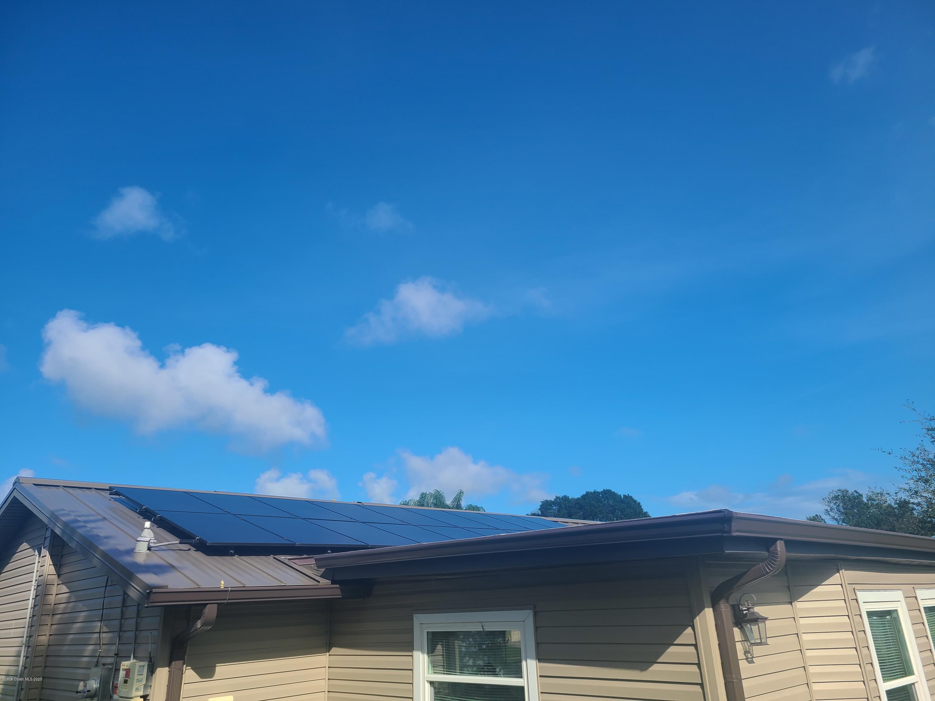 1491 Creel Road Northeast Palm Bay, FL 32905 - Photo 13 of 50 a view of a sky from a balcony