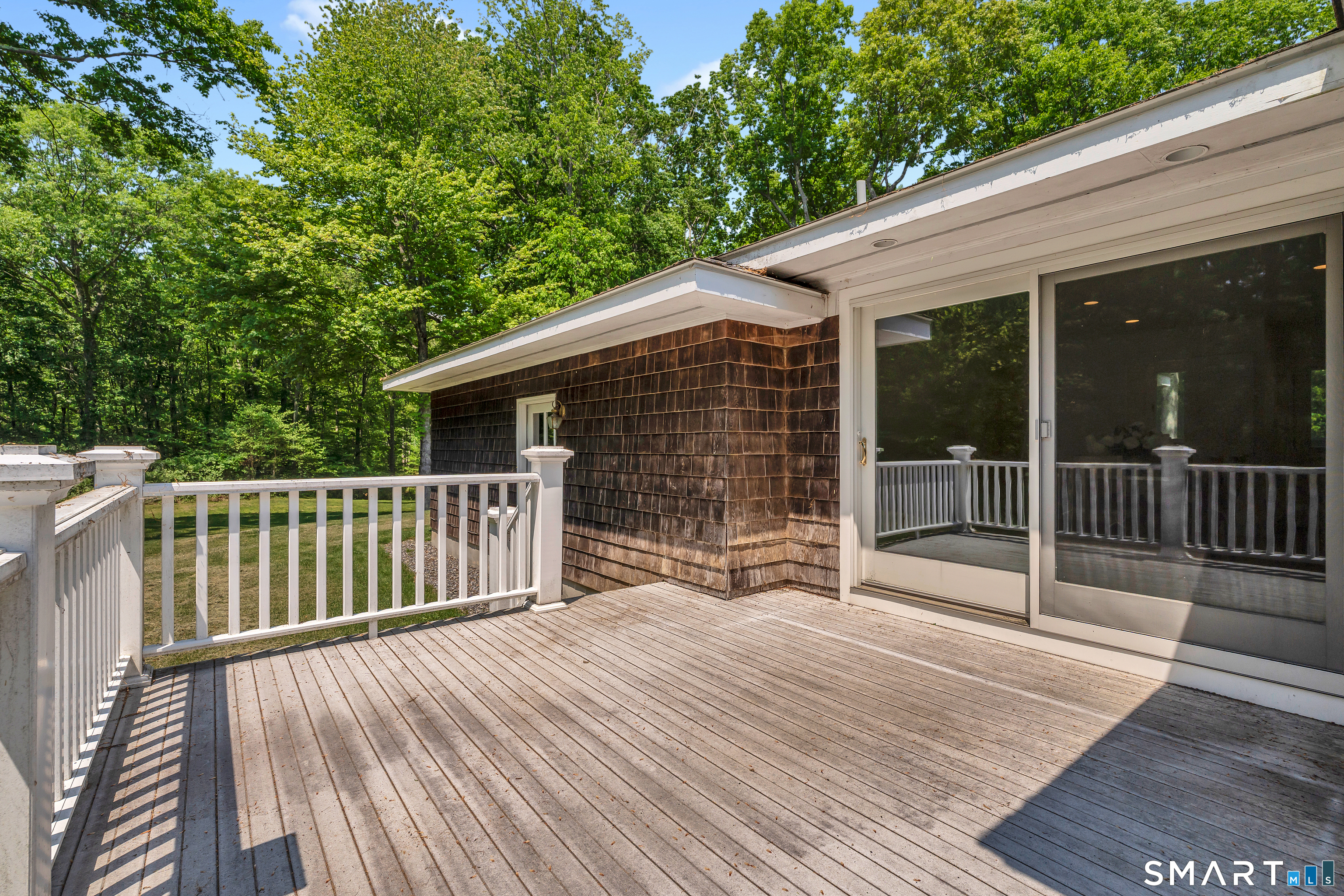 30 Maltbie Road Newtown, CT 06470 - Photo 13 of 40 a view of backyard with a deck