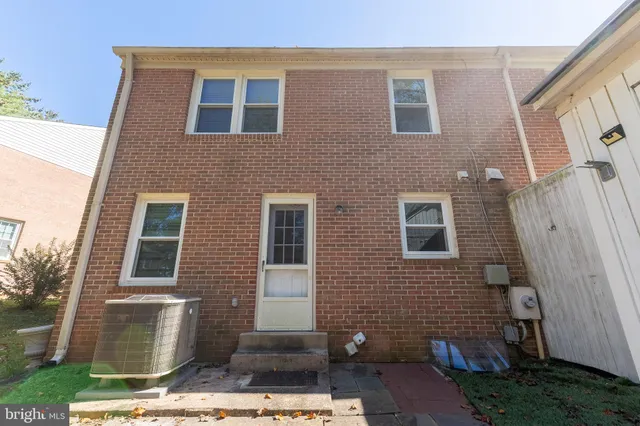 a front view of a house with stairs
