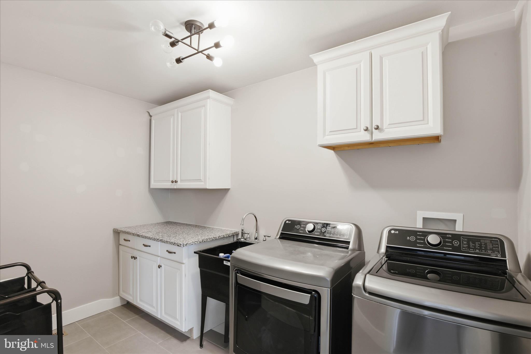 339 Bowyer Lane Lititz, PA 17543 - Photo 28 of 41 2nd Floor Laundry Sink/Utility Sink/Cabinets