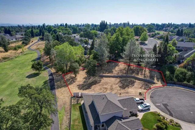 a view of city from balcony with furniture
