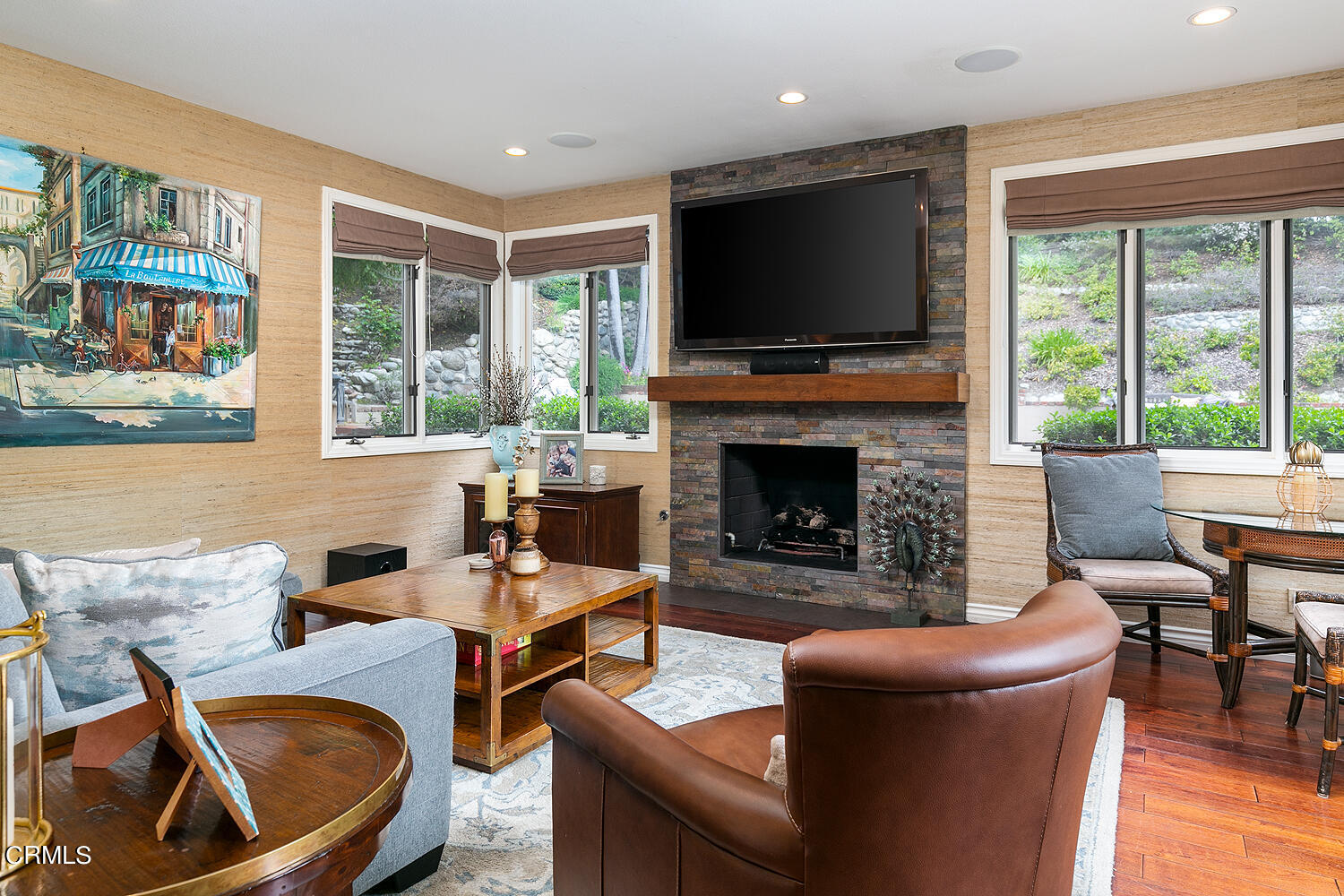 1429 Rutherford Drive Pasadena, CA 91103 - Photo 14 of 34 a living room with furniture a flat screen tv and a fireplace