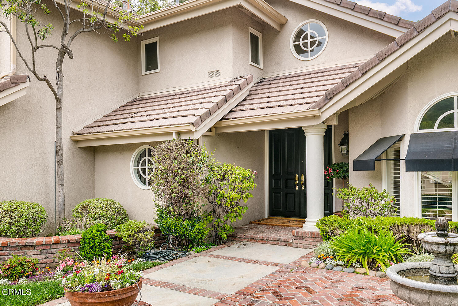 1429 Rutherford Drive Pasadena, CA 91103 - Photo 2 of 34 a front view of a house with plants