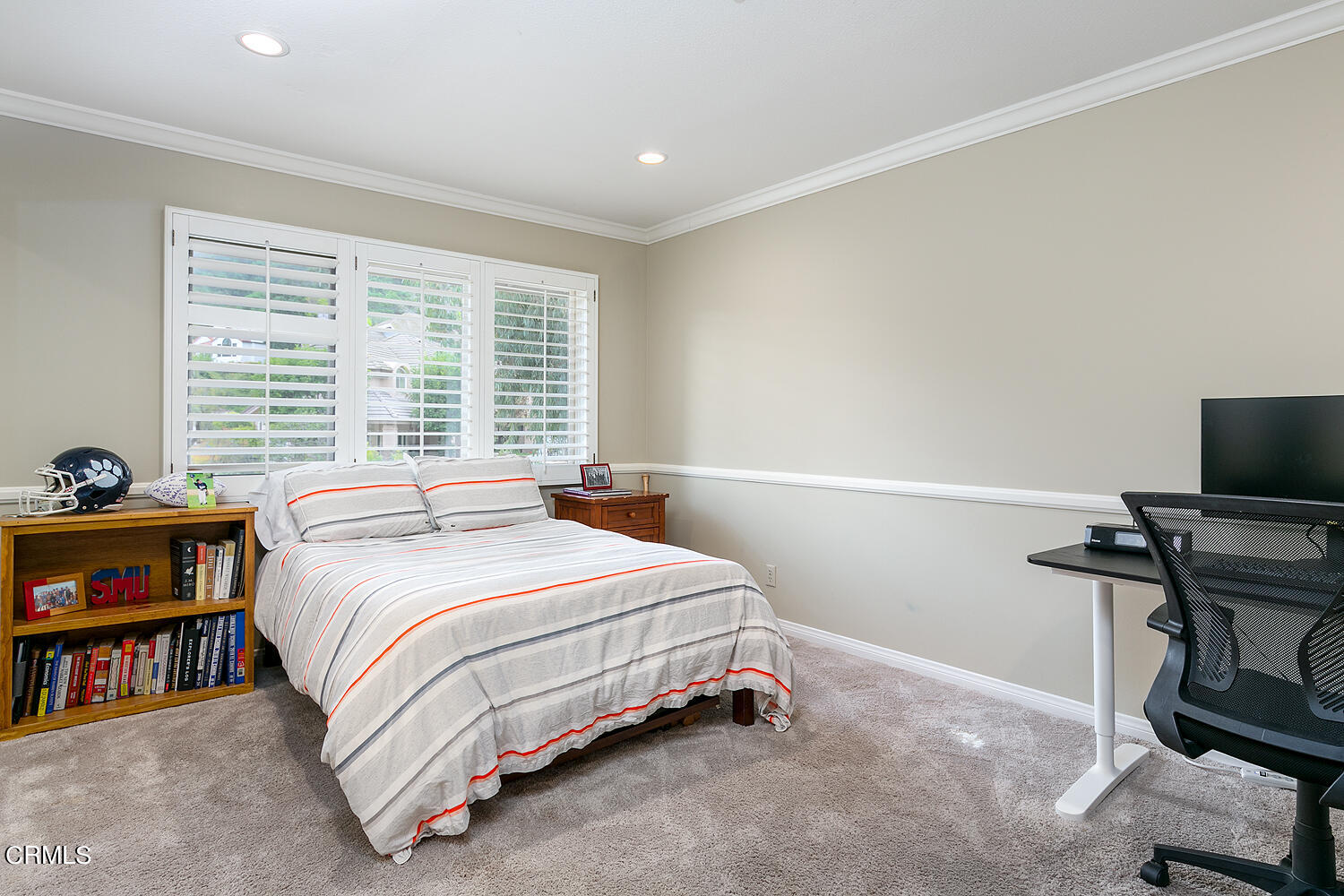 1429 Rutherford Drive Pasadena, CA 91103 - Photo 23 of 34 a bedroom with a bed and a chair in it