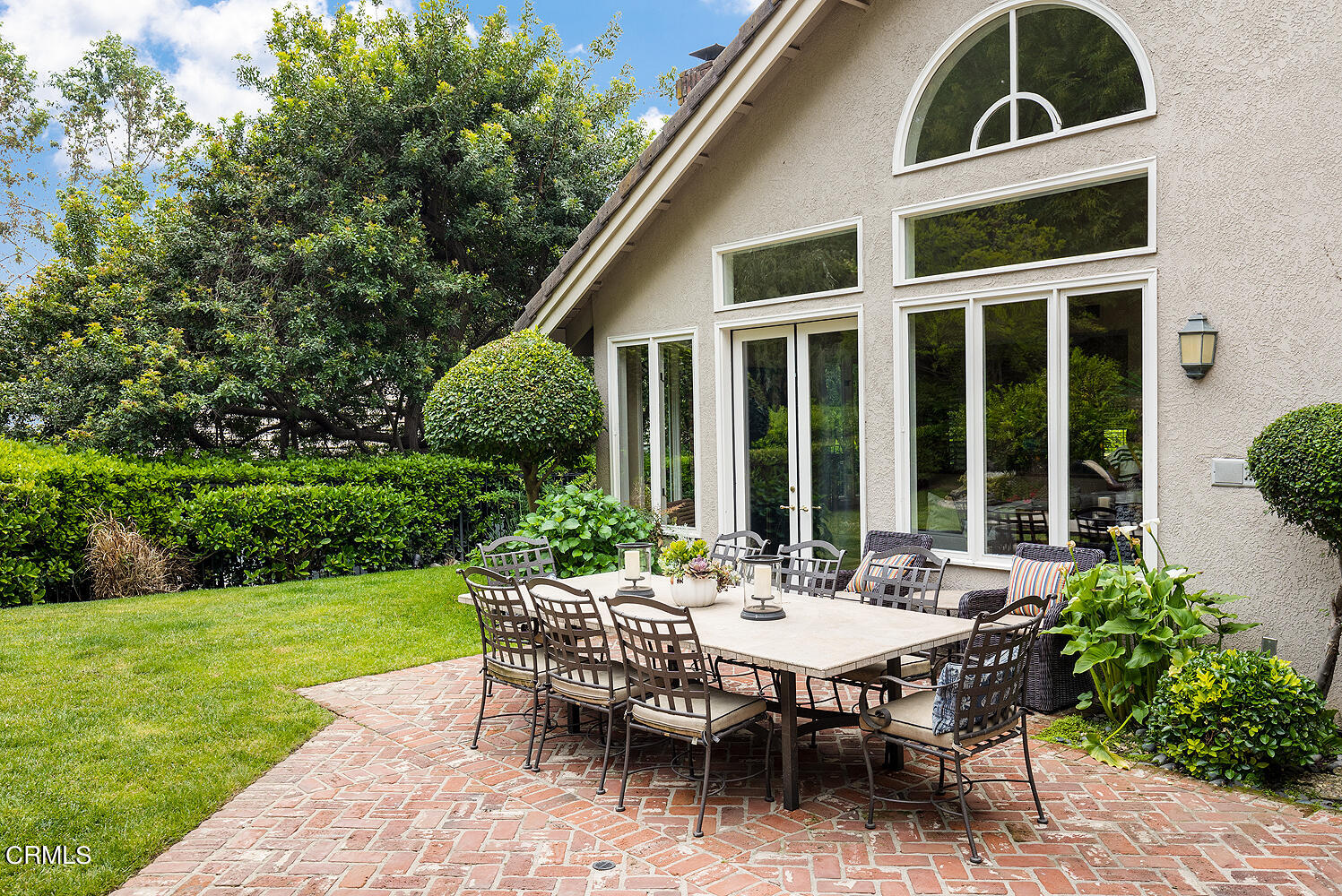 1429 Rutherford Drive Pasadena, CA 91103 - Photo 27 of 34 a view of a patio with table and chairs and potted plants