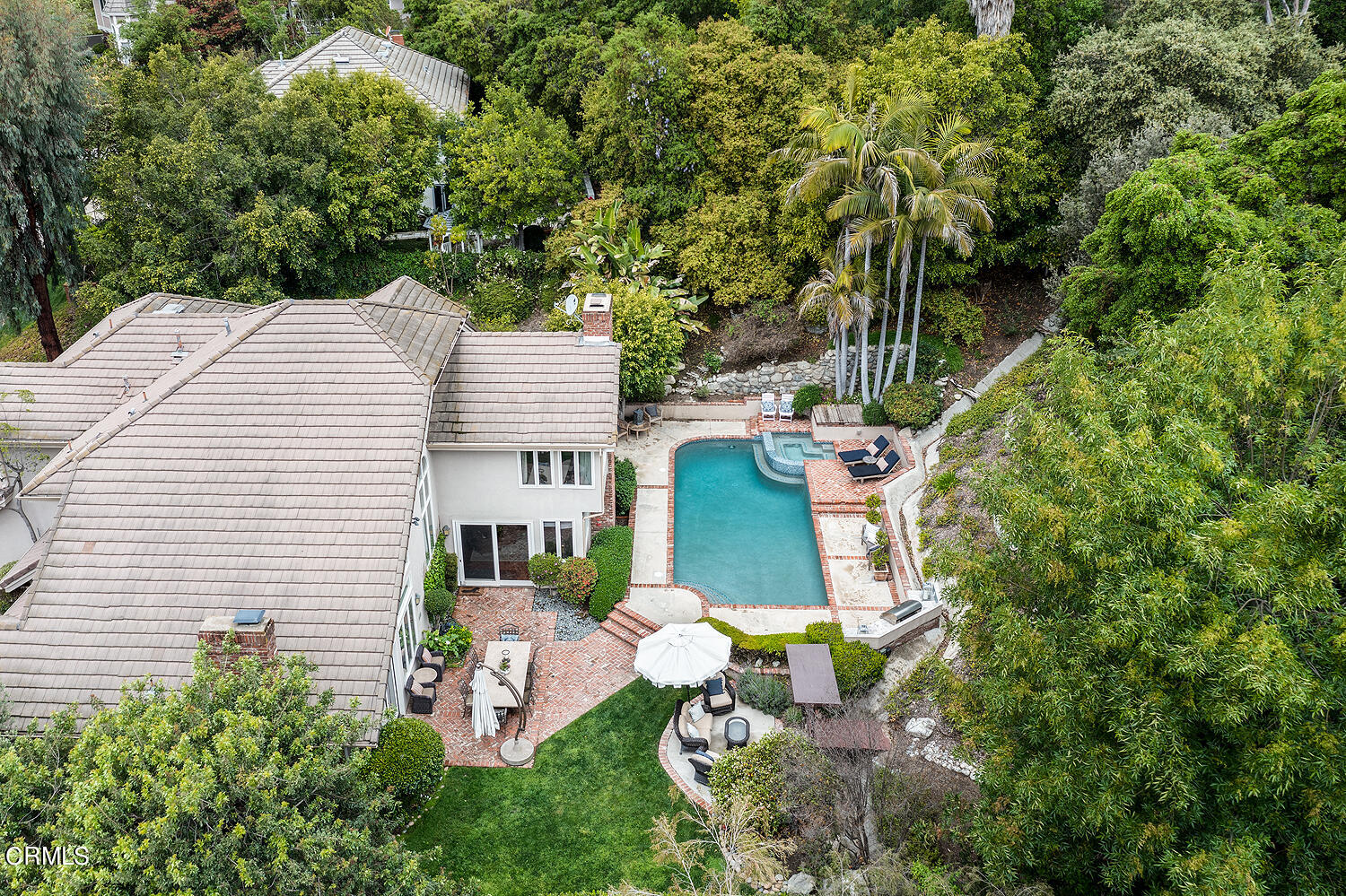 1429 Rutherford Drive Pasadena, CA 91103 - Photo 33 of 34 a aerial view of a house with table and chairs and potted plants
