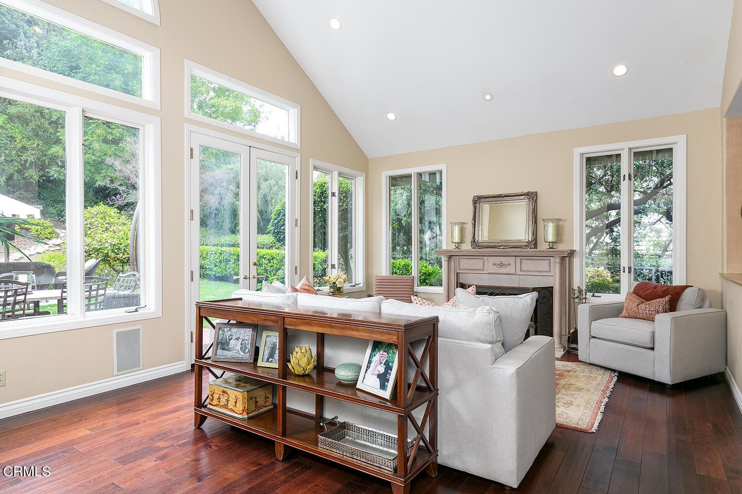 1429 Rutherford Drive Pasadena, CA 91103 - Photo 4 of 34 a bedroom with furniture a large window and wooden floor