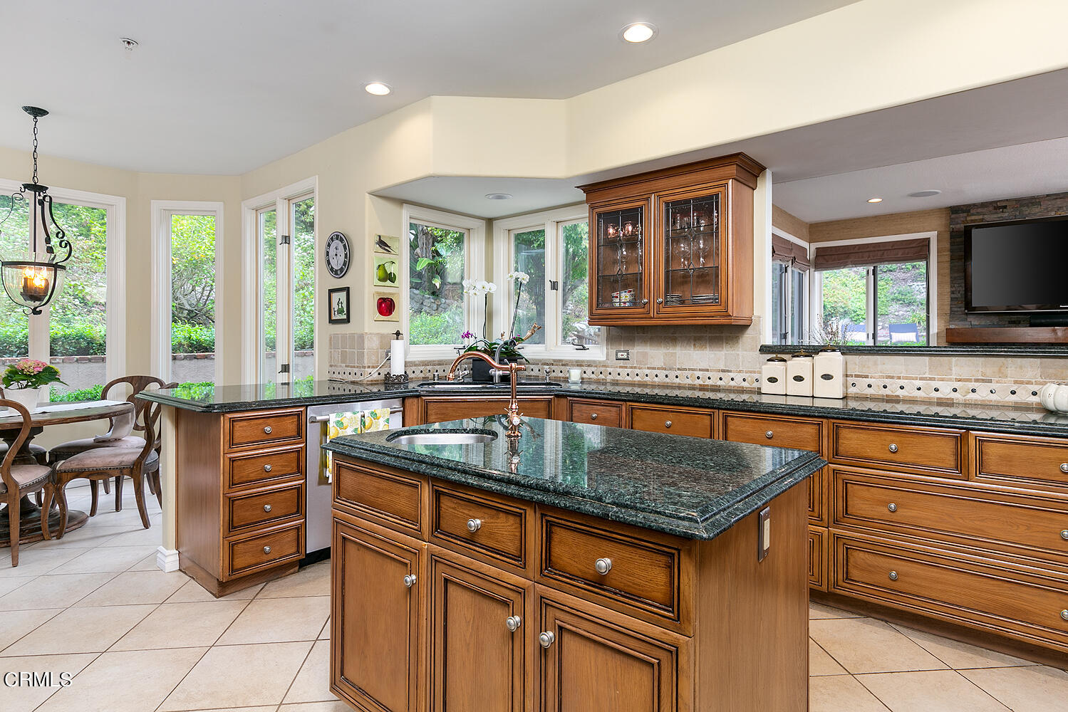 1429 Rutherford Drive Pasadena, CA 91103 - Photo 10 of 34 a kitchen with stainless steel appliances granite countertop a sink and a granite counter tops