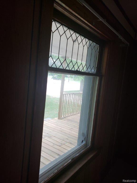 2028 Mitchell Lake Road Attica, MI 48412 - Photo 9 of 27 Original Leaded Windows with Storms