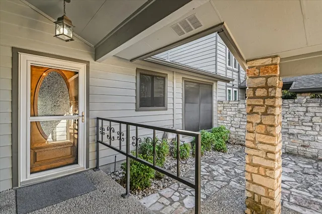 a view of a house with a porch