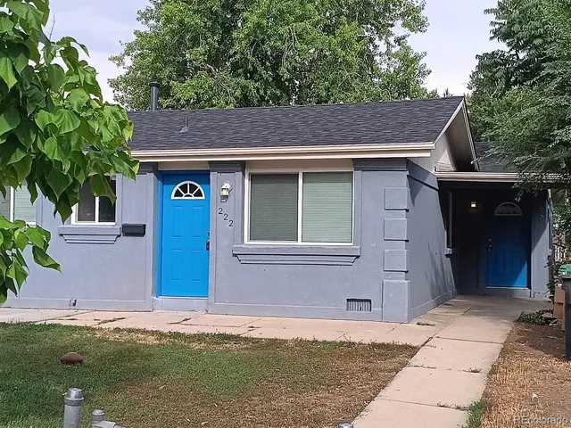 a house view with a garden space