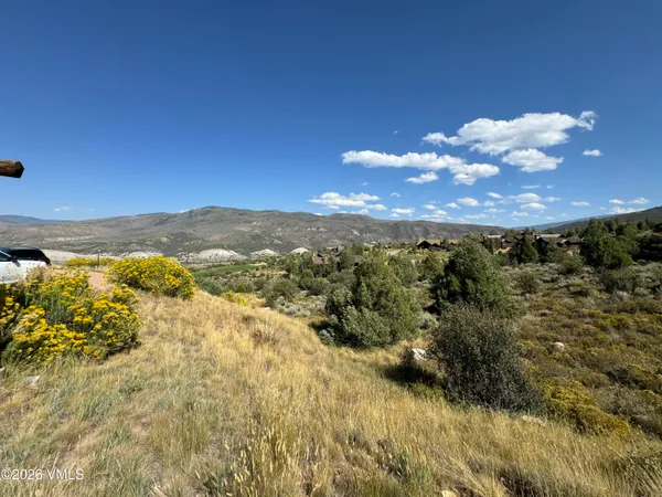a view of mountain with sunset