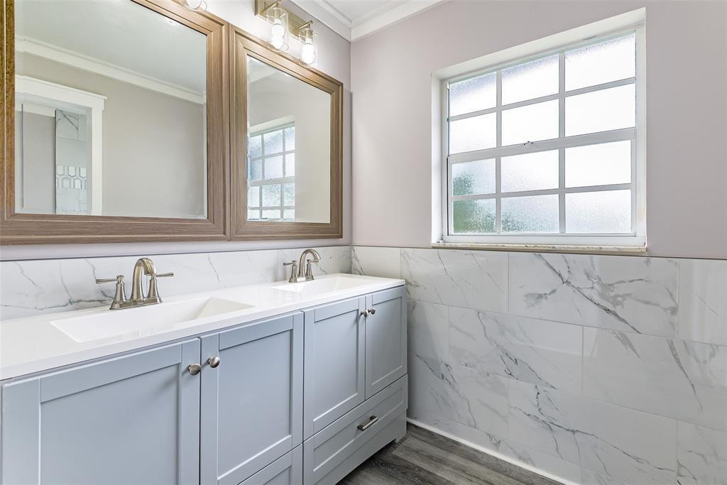 22500 Labrador Street Boca Raton, FL 33428 - Photo 19 of 27 a bathroom with a sink and a vanity