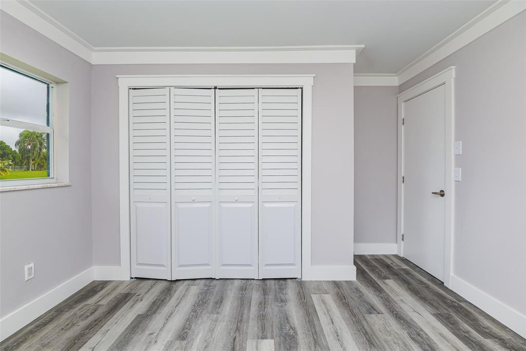 22500 Labrador Street Boca Raton, FL 33428 - Photo 23 of 27 a view of room with window and hardwood floor
