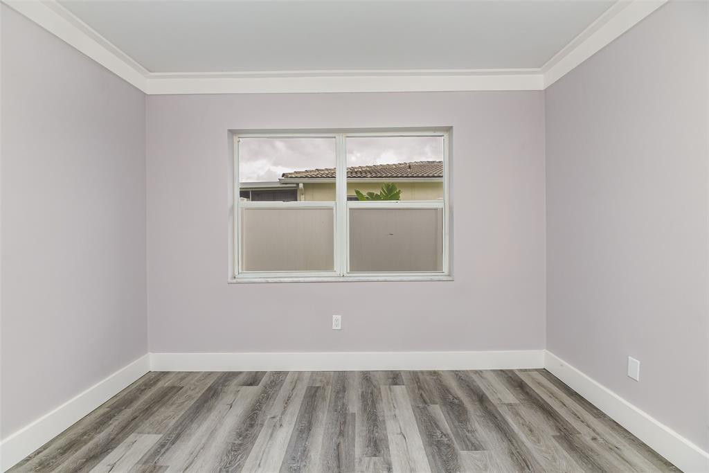 22500 Labrador Street Boca Raton, FL 33428 - Photo 26 of 27 a view of an empty room with a window