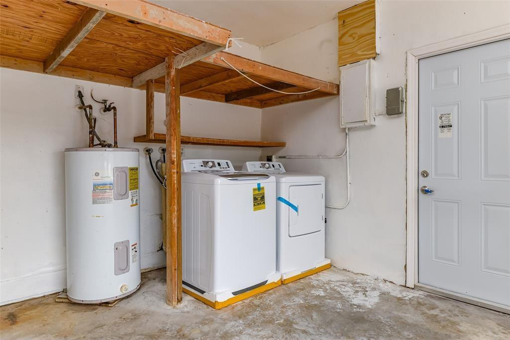 22500 Labrador Street Boca Raton, FL 33428 - Photo 27 of 27 a view of a storage & utility room with a washer and dryer
