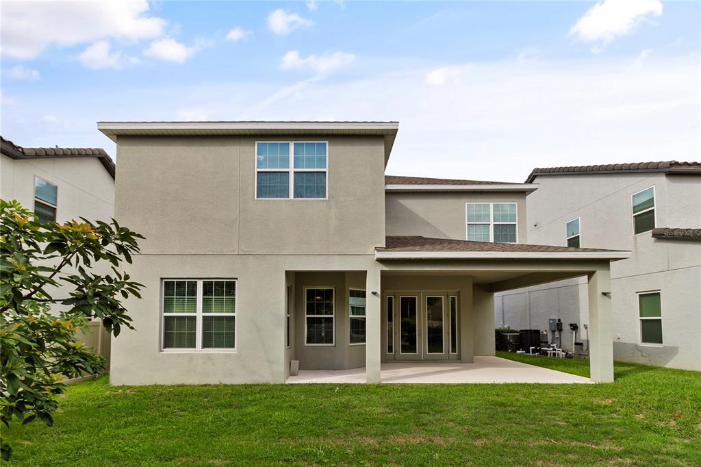 8764 Powder Ridge Trail Windermere, FL 34786 - Photo 41 of 43 front view of a house with a yard