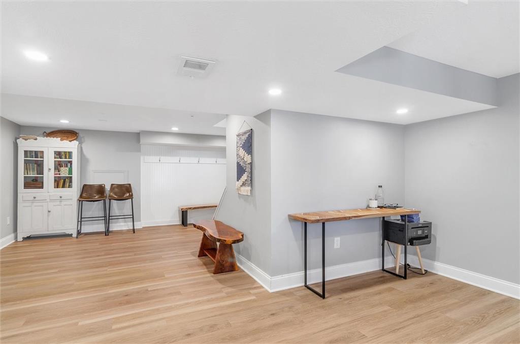 2389 Mill Grove Road Pittsburgh, PA 15241 - Photo 21 of 25 a view of a workspace with furniture and wooden floor