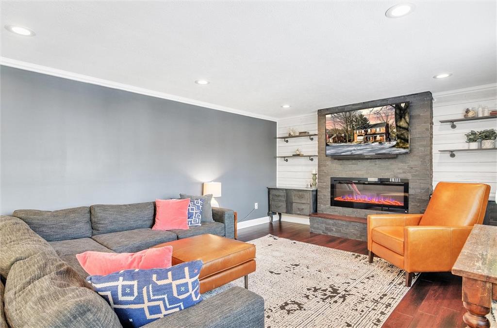 2389 Mill Grove Road Pittsburgh, PA 15241 - Photo 4 of 25 a living room with furniture and a fireplace