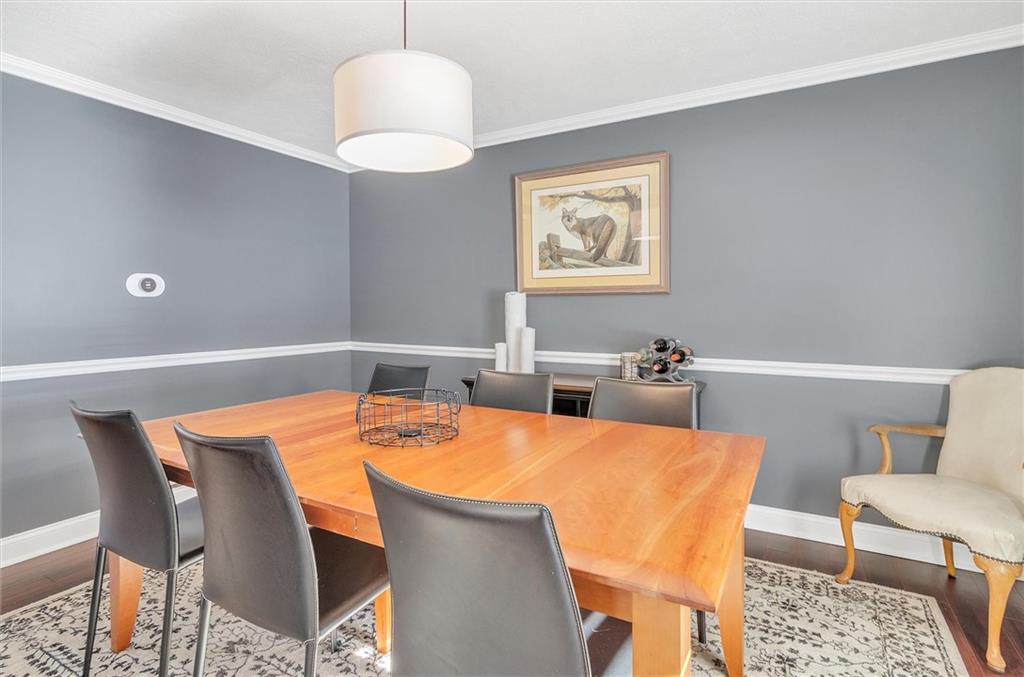 2389 Mill Grove Road Pittsburgh, PA 15241 - Photo 7 of 25 a view of a dining room with furniture and a chandelier