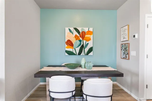 a view of a dining room with furniture