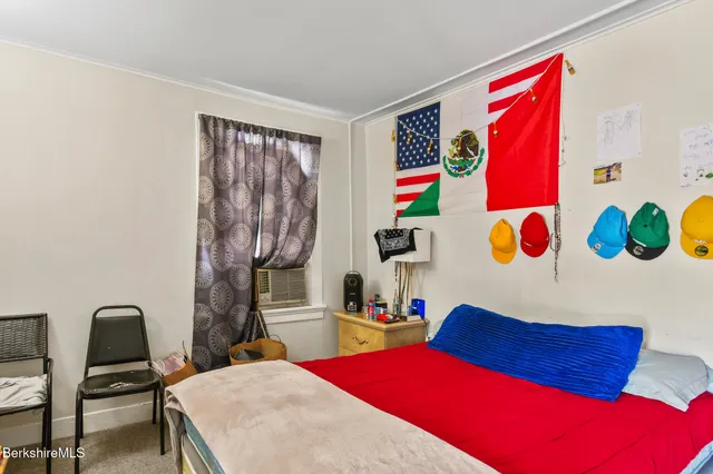 a room with furniture and a bed