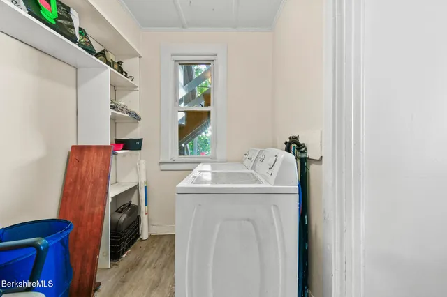 a utility room with dryer and washer