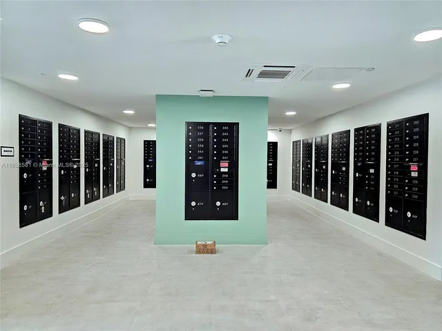 a room with gym equipment with a large window