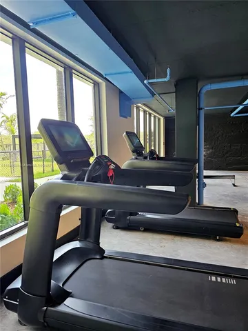 a view of a house with a swimming pool and a big yard