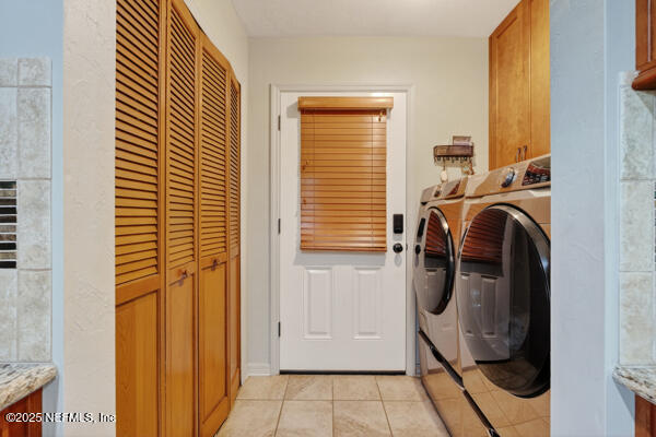 6519 Neale Road Melrose, FL 32666 - Photo 21 of 57 a view of walk in closet with clothes and shoes