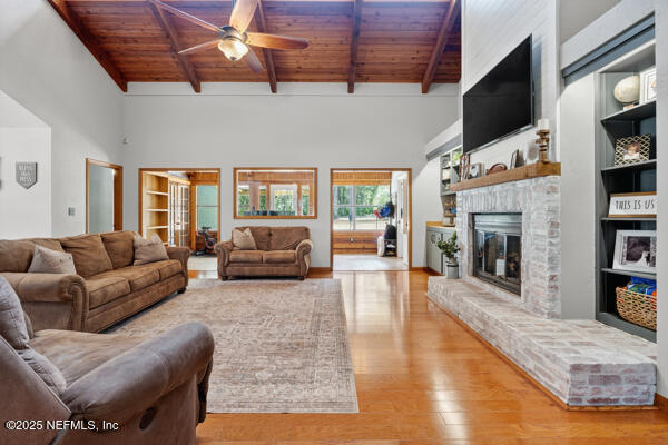 6519 Neale Road Melrose, FL 32666 - Photo 28 of 57 a living room with furniture fireplace and flat screen tv