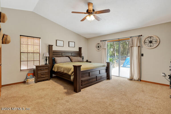 6519 Neale Road Melrose, FL 32666 - Photo 30 of 57 a bedroom with a bed and a chandelier