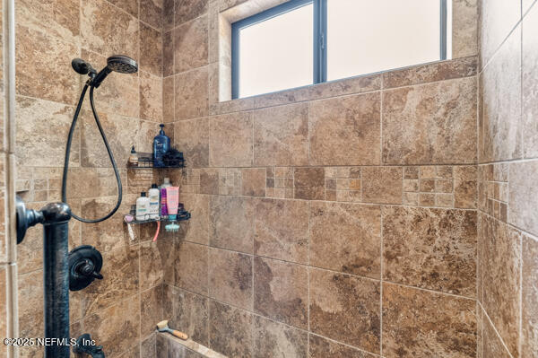 6519 Neale Road Melrose, FL 32666 - Photo 35 of 57 a bathroom with a shower