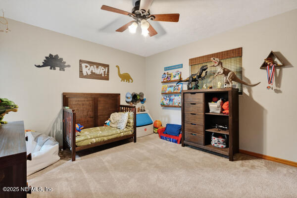 6519 Neale Road Melrose, FL 32666 - Photo 40 of 57 a bedroom with bed and a couch