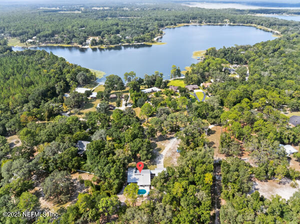 6519 Neale Road Melrose, FL 32666 - Photo 50 of 57 an aerial view of residential houses with outdoor space and lake view