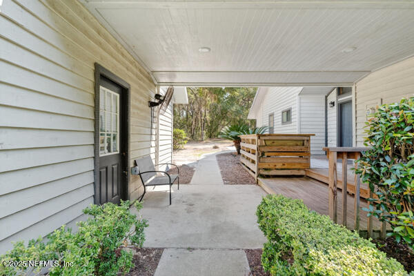 6519 Neale Road Melrose, FL 32666 - Photo 9 of 57 a house view with a sitting space and garden