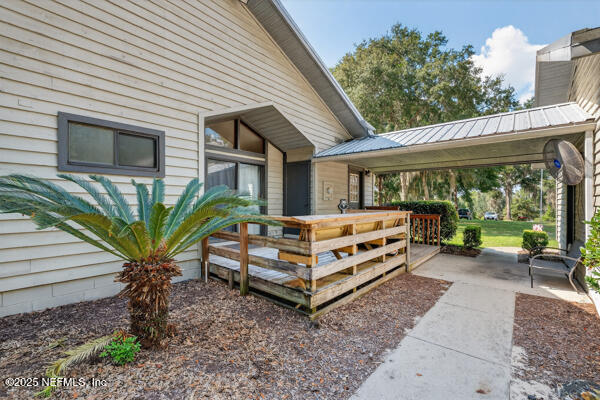 6519 Neale Road Melrose, FL 32666 - Photo 10 of 57 a front view of a house with garden